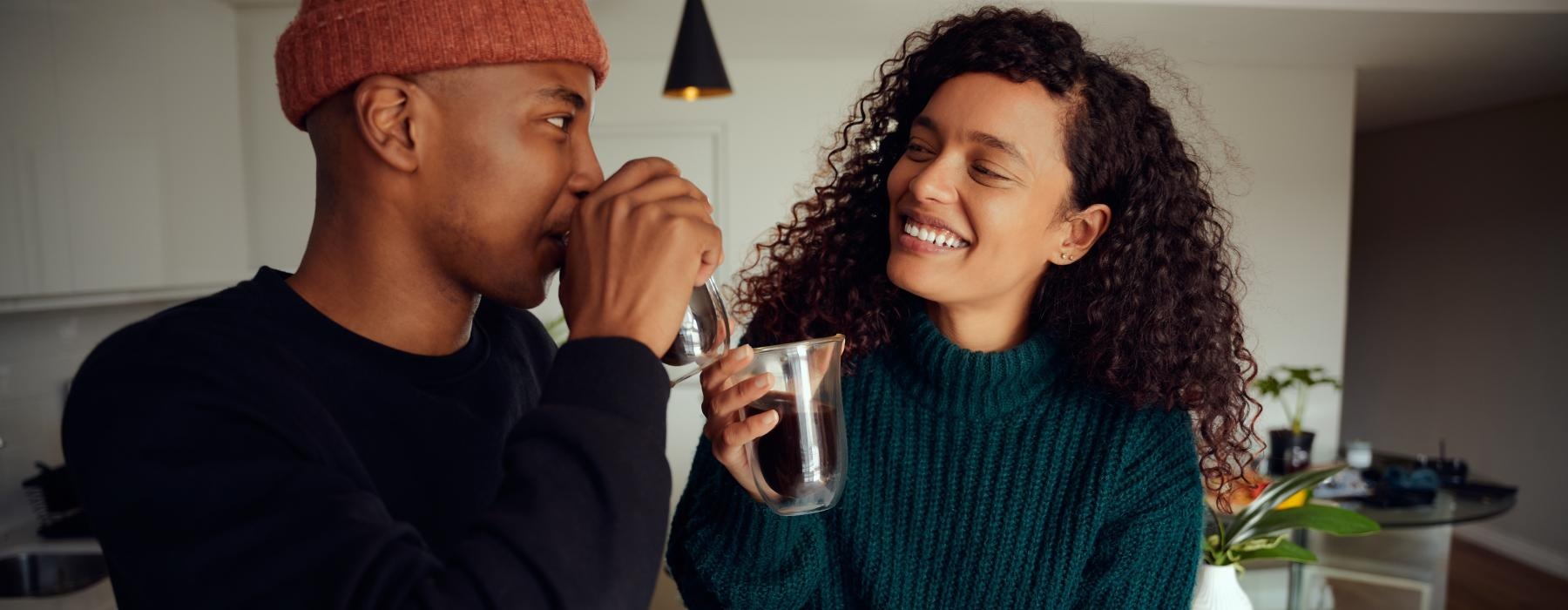 a man and a woman drinking