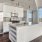 a kitchen with white cabinets