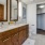 a bathroom with a sink and a closet