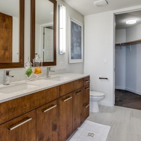 Spacious bathrooms with everything you need a bathroom with a sink and a closet