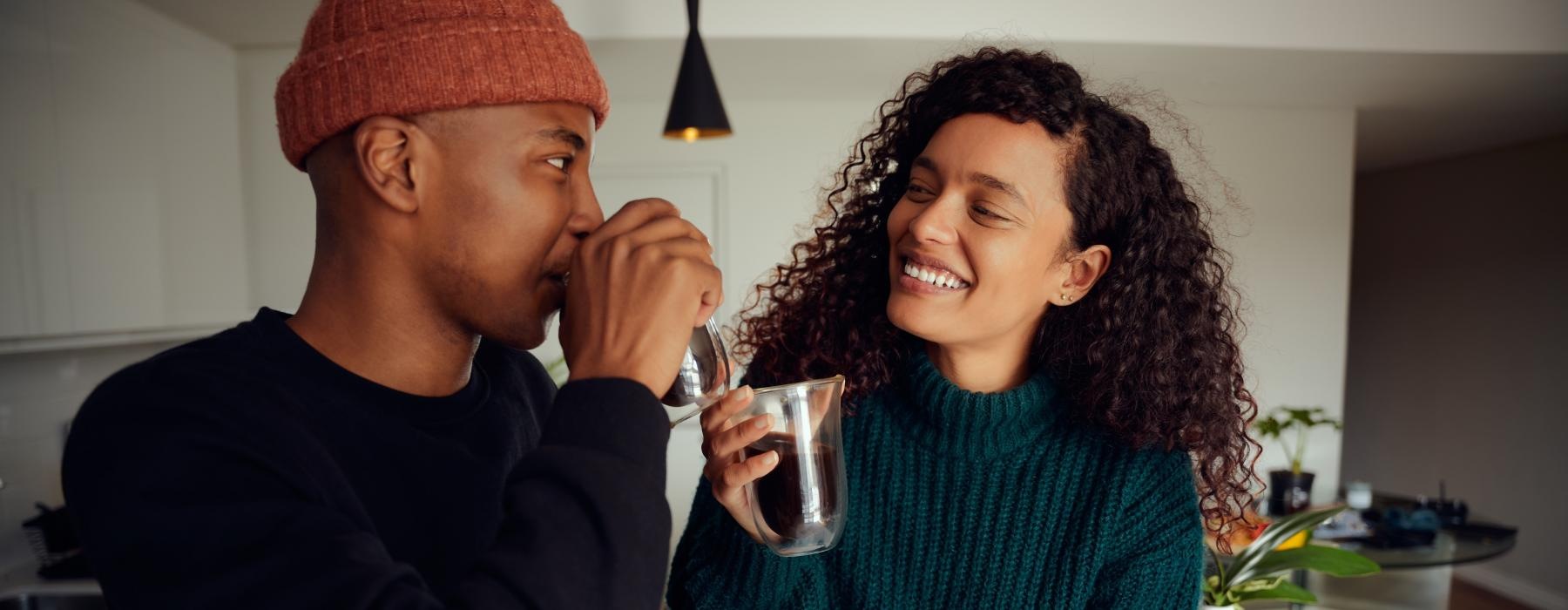 a man and a woman drinking