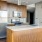 a kitchen with wooden cabinets